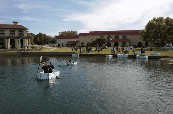 students on pond